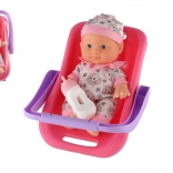 Bábika bábätko v nosiči s fľaštičkou 22 cm