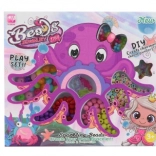 Plastové koráliky v krabičke s motívom chobotnice