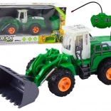 Zelený diaľkovo ovládaný nakladač s pohyblivým ramenom