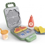 Zelený vaflovač pre dievčenské domácnosti