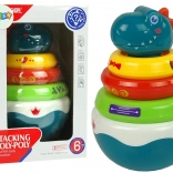 hrkálka dinosaurus s farebnými krúžkami a kolísavou základňou