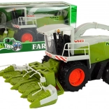 Veľký zelený kombajn s pohyblivými časťami