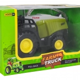 kovový kombajn – hračka s pohyblivými prvkami