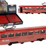 Červený kovový vlak na trecí pohon so zvukmi