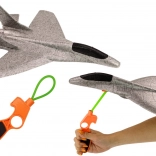 Polystyrénová stíhačka s vystreľovačom sivá