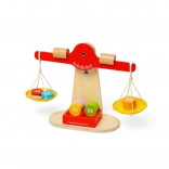 Drevená váha s vyvažovacími závažiami
